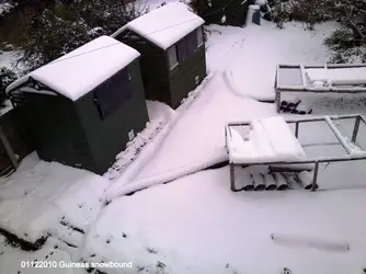 011220101055 aerial shed in snow.webp